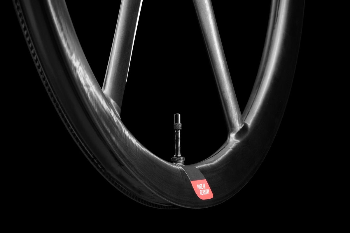 False Flat Bike Ahead Composites BiTurbo Gravel Aero carbon wheel with aerodynamic spokes and Made in Germany label